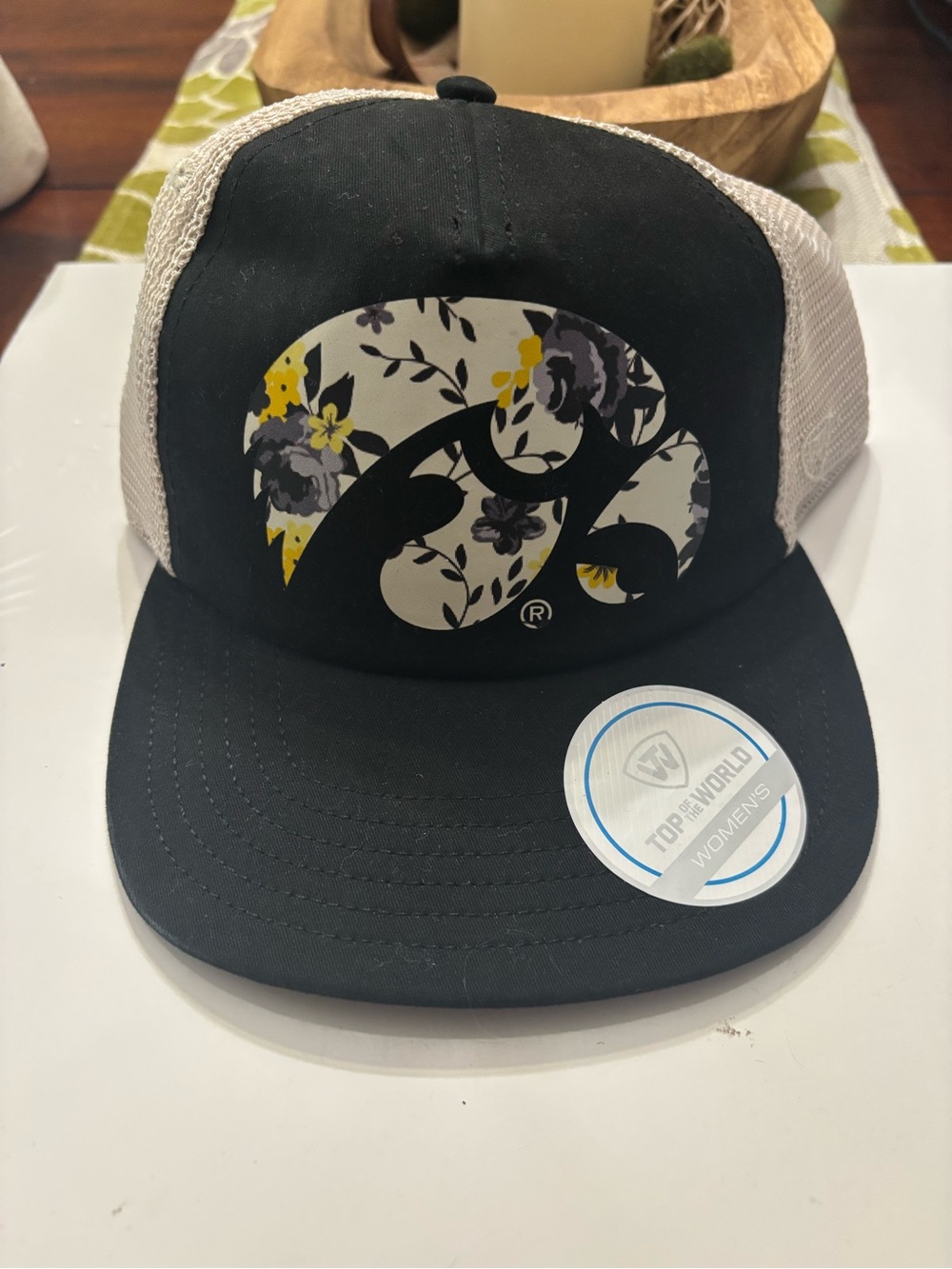 Top of the World Women's Black and Cream Floral Logo Trucker Hat Iowa Cornhusker